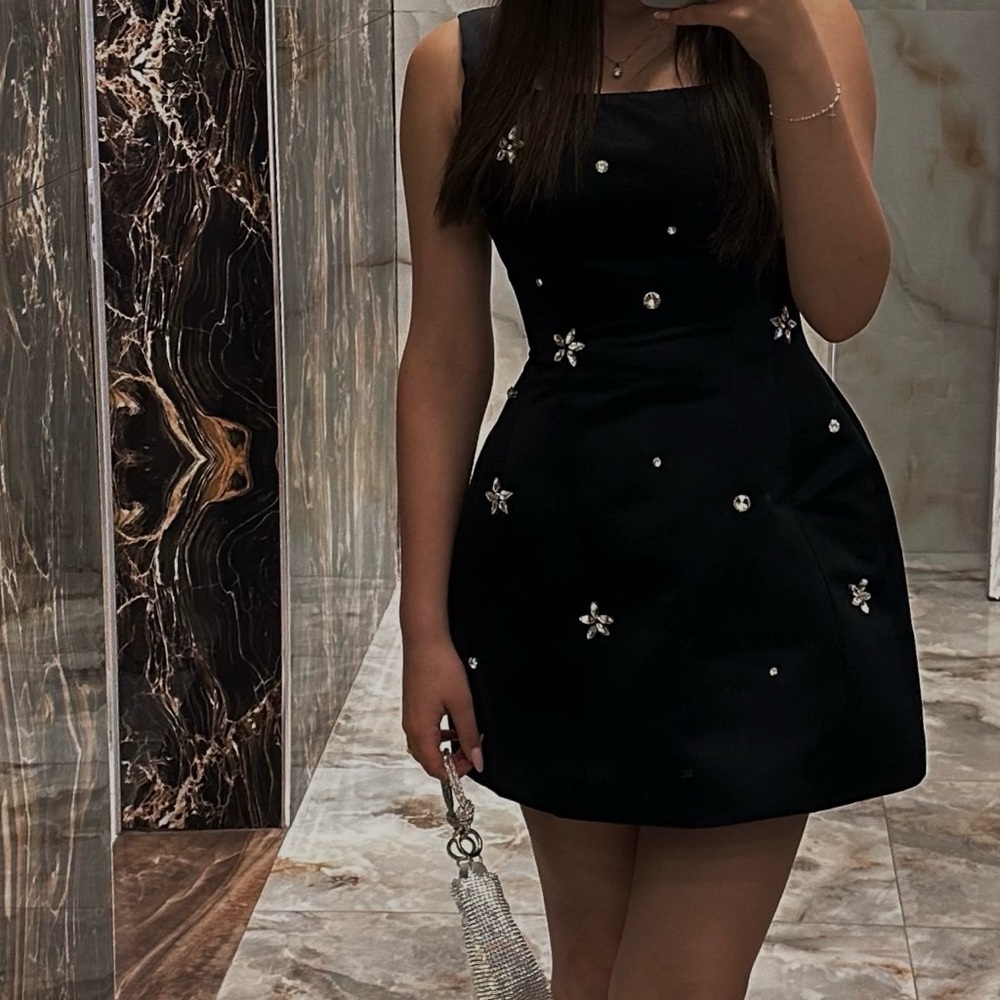 Black Structured Hourglass Dress. Back laces like a corset. Worn twice like new